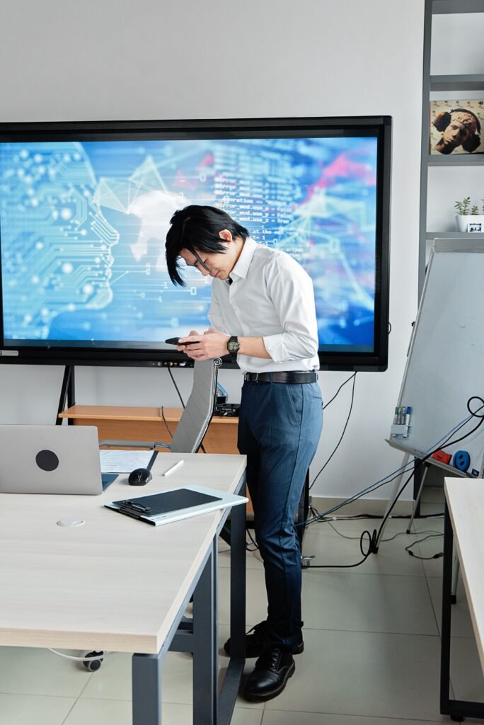 Professional reviewing AI-driven business insights on a smartphone