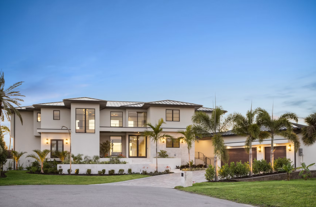 Modern house with pool at dusk